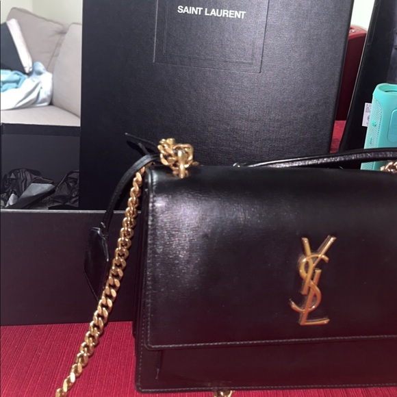 Yves Saint Laurent Handbags - Sunset logo chain bag, brand new only worn twice . Bag comes with box.